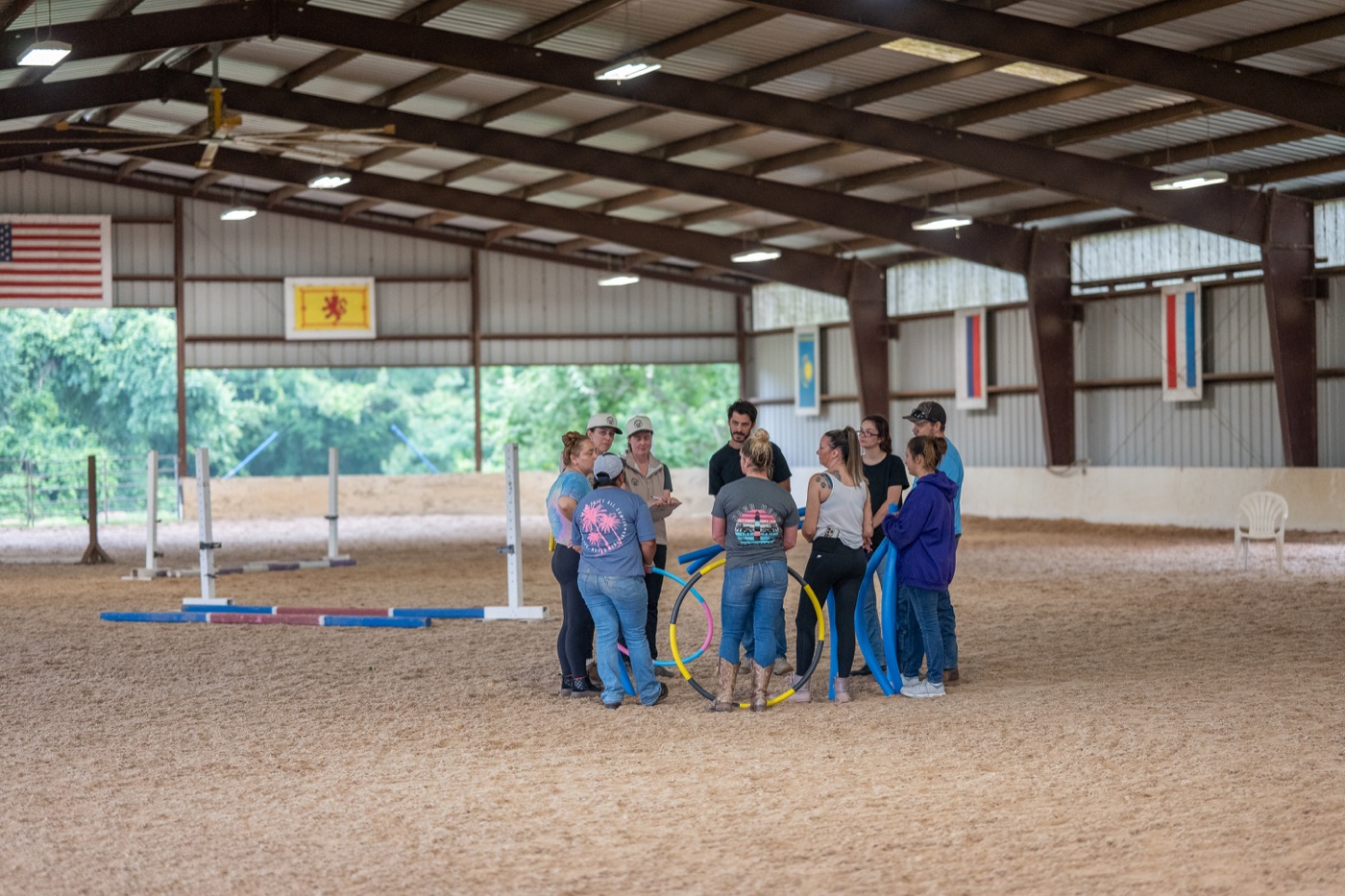 A group working through an activity together in the arena